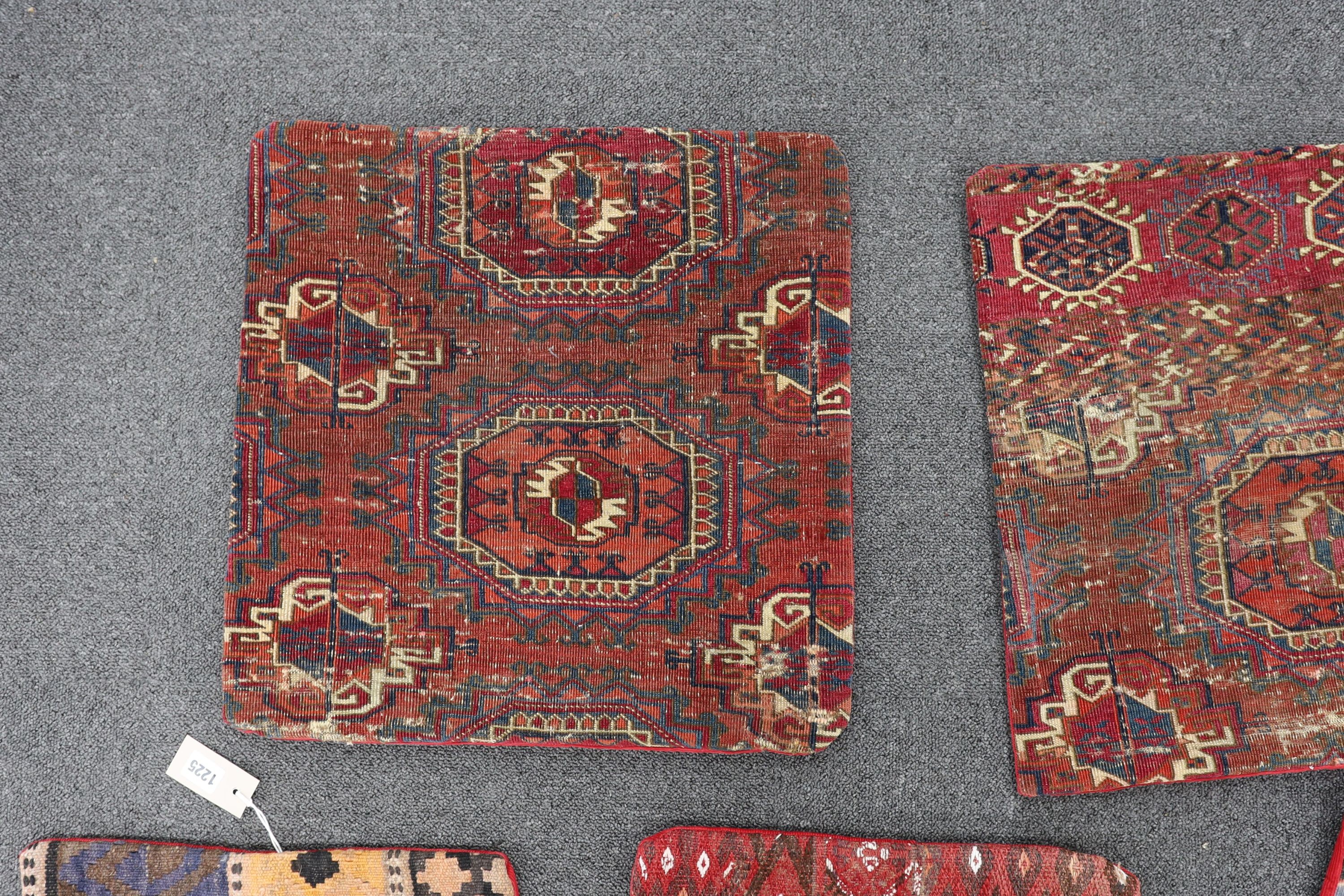 Five assorted Kilim and Tekke carpet cushion covers, largest 48 x 48cm